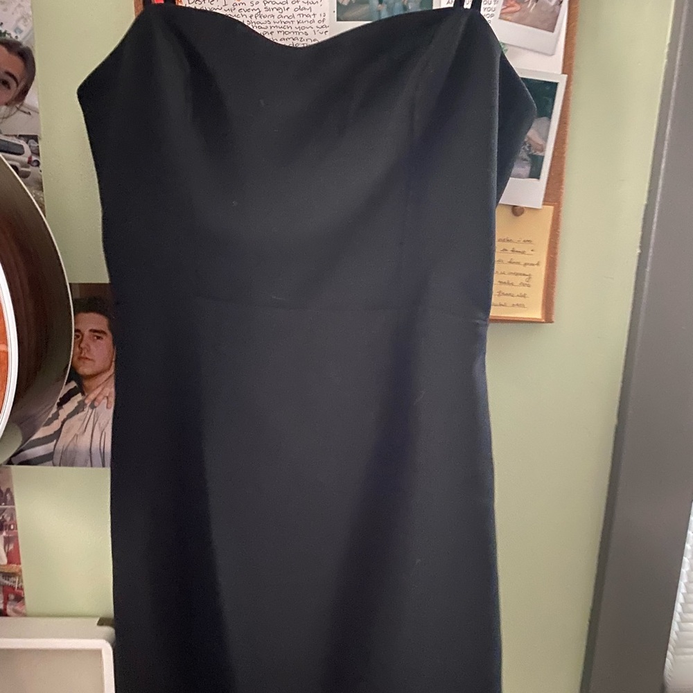 Mini black dress with open back